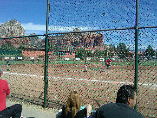 Sedona red rocks behind a downtown ball field — a few blocks from Red Rock Suites